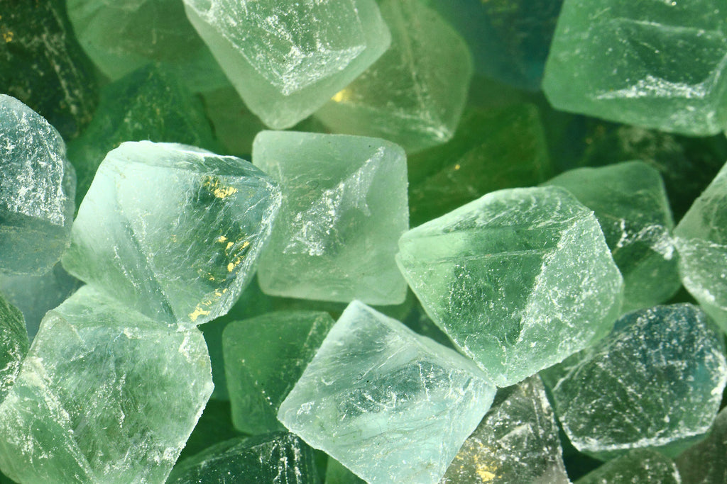A pile of green fluorite stones