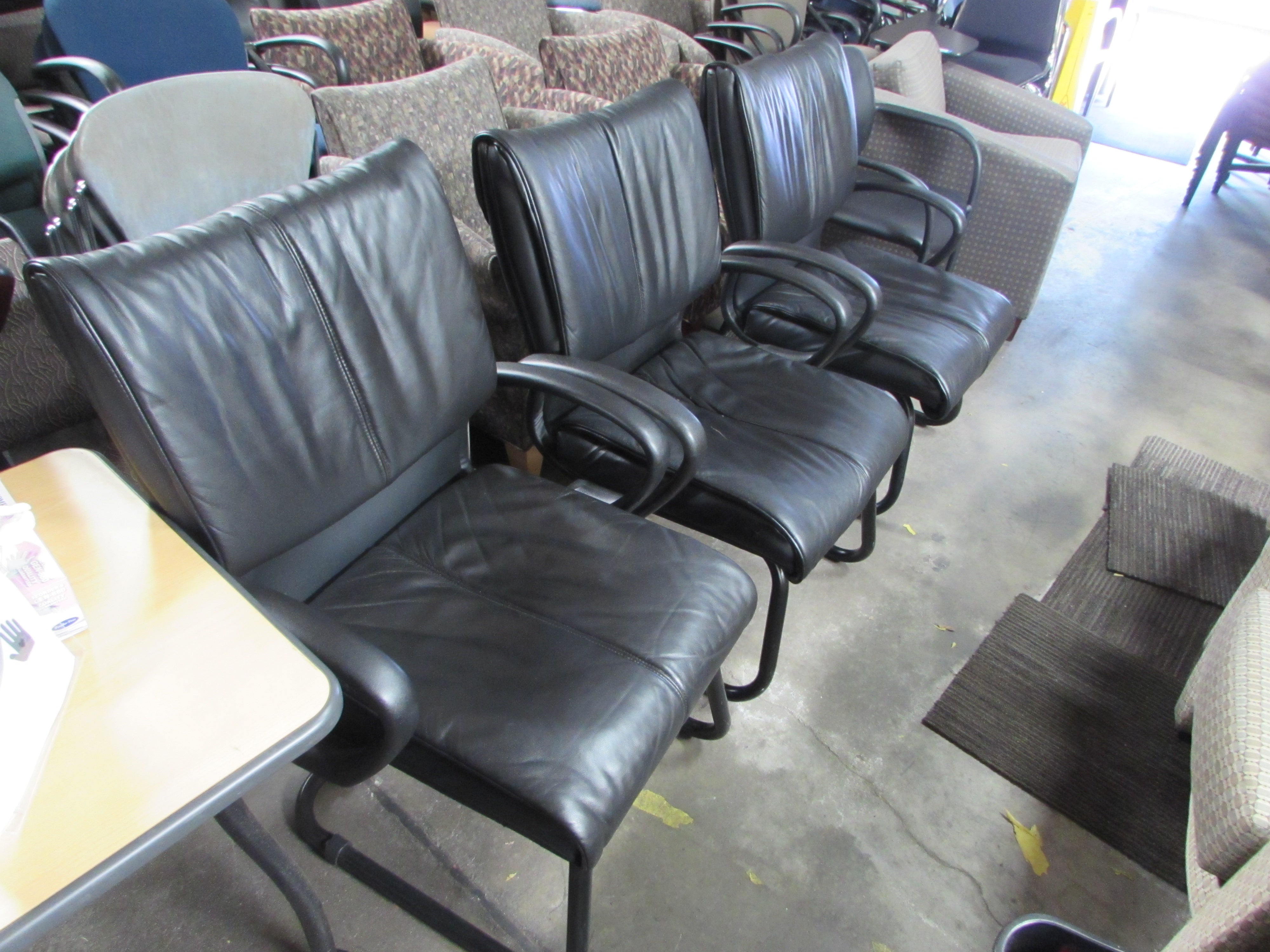 black leather guest chairs  side chairs  lobby chairs