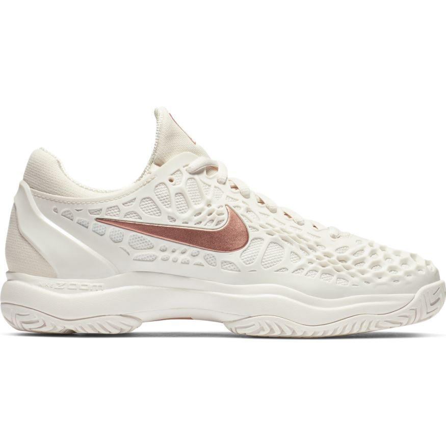 rose gold nike tennis shoes