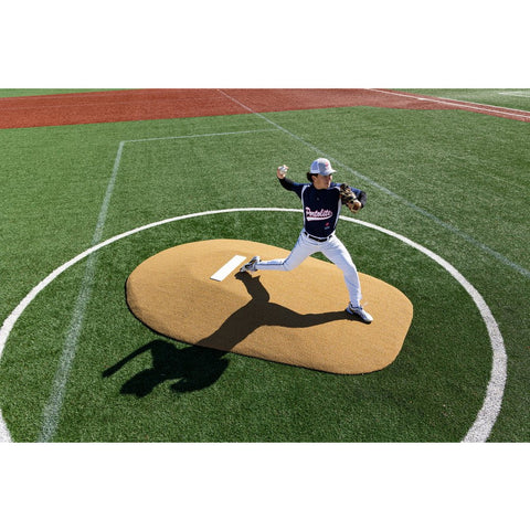 PortoLite 8" Full Length Portable Pitching Mound tan turf with player pitching on mound