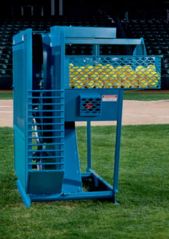 Commercial Pitching Machines Iron Mike MP-4 Pitching Machine On The Field
