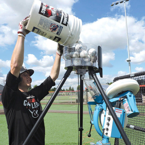 JUGS Carousel Automatic Ball Feeder With Pitching Machine and Player