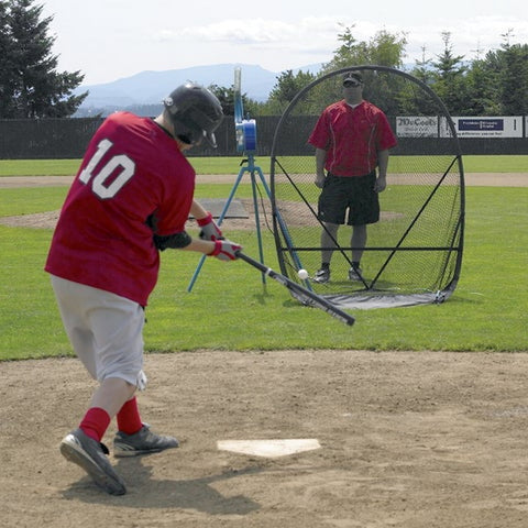 Jugs Small Ball Pitching Machine In Practice with Batter