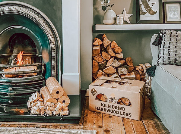 Kiln Dried Firewood Stacked In Lounge next to a fireplace 