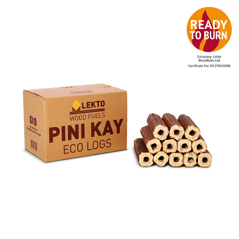 A box of Lekto Pini Kay briquettes next to the product