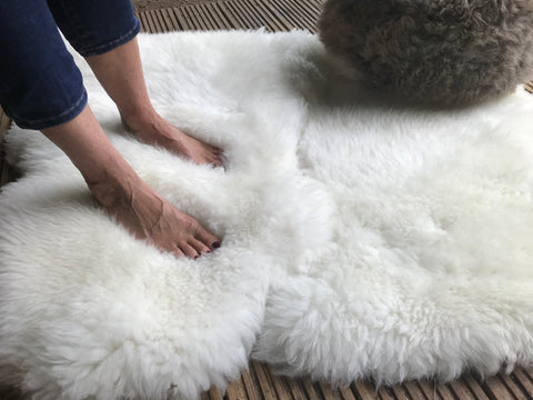 Sheer bliss feet in Sheepskin blanket rug from @flaxandfleececompany