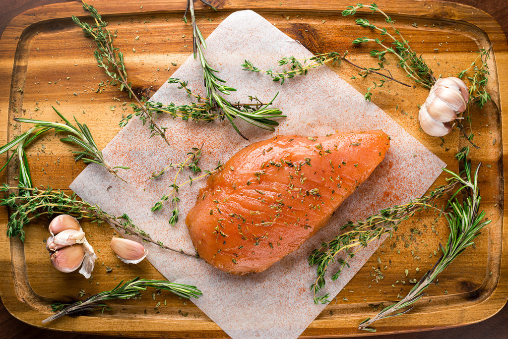 chicken breast soaking in marinade