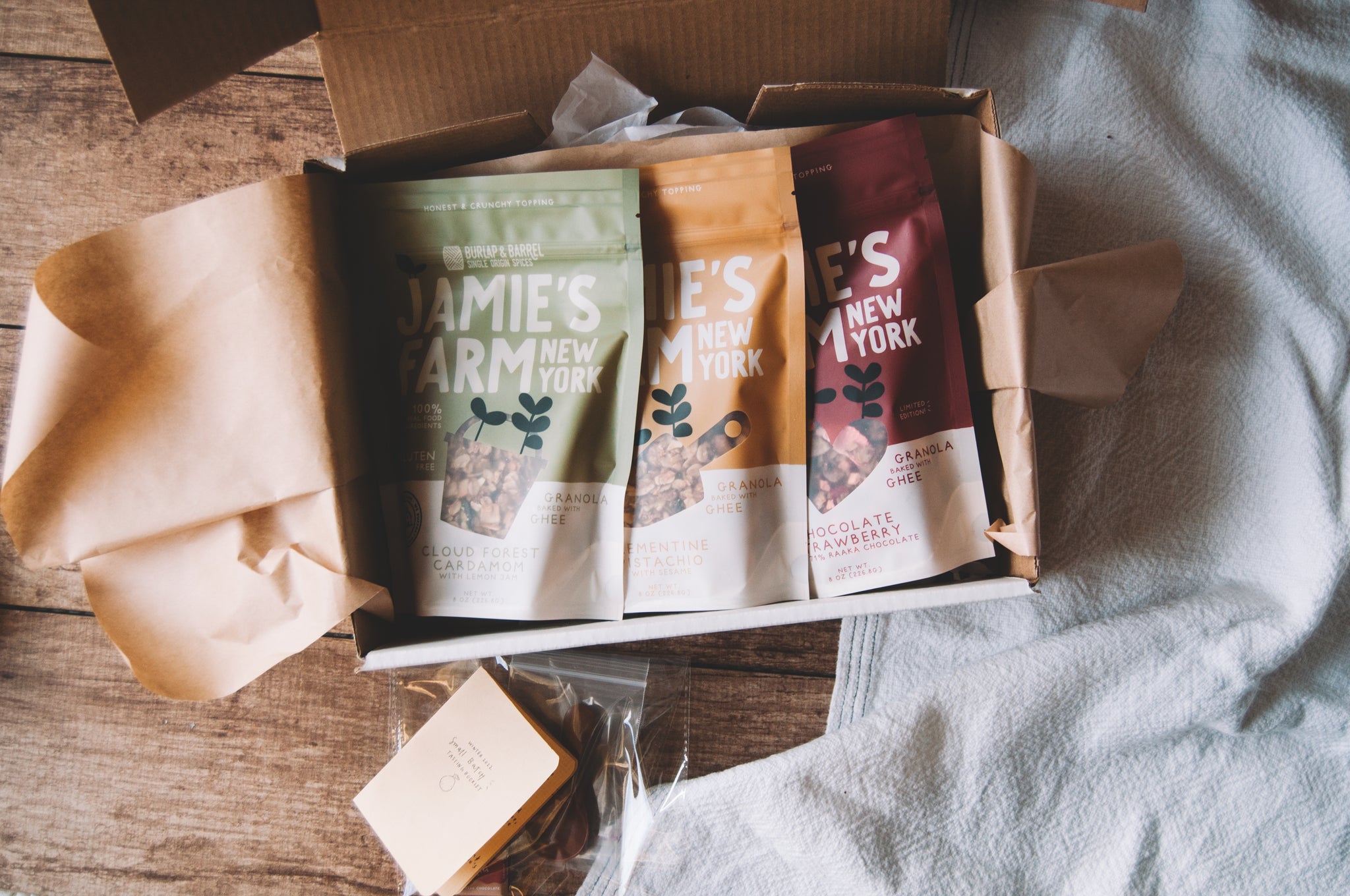 Jamie's Farm New York Granola | Limited-Edition Seasonal Flavors, Gluten-Free and Baked with Ghee | Burlap & Barrel Collaboration Cardamom Granola | Raaka Chocolate Strawberry Granola