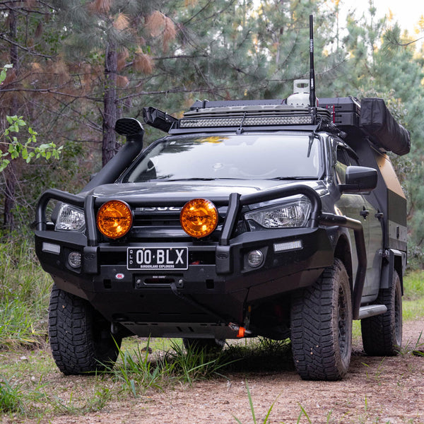 Grey and Black Isuzu Dmax kitted up with Opposite Lock Accessories and Redback Exhaust