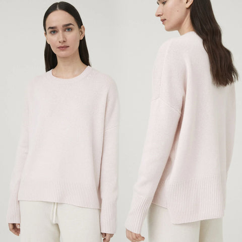 Lisa Yang Mila Sweater in Soft Pink. With attention to its details, this timeless crew neck redefines the classic pullover. With a dropped shoulder, side vents and longer back, it flatters the feminine form. Ribbed trims highlights the neckline, cuffs, and hem.