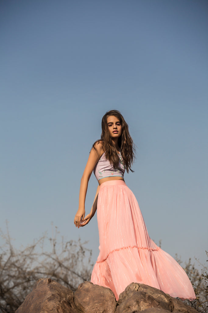 Woman In A Lush Long Skirt Posing On A Blue Studio Background Stock Photo,  Picture and Royalty Free Image. Image 118830429.