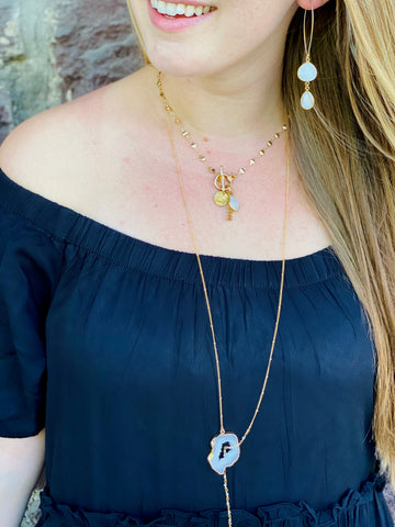 unique celestial and moon semi precious gemstone layering necklace set in elegant gold 