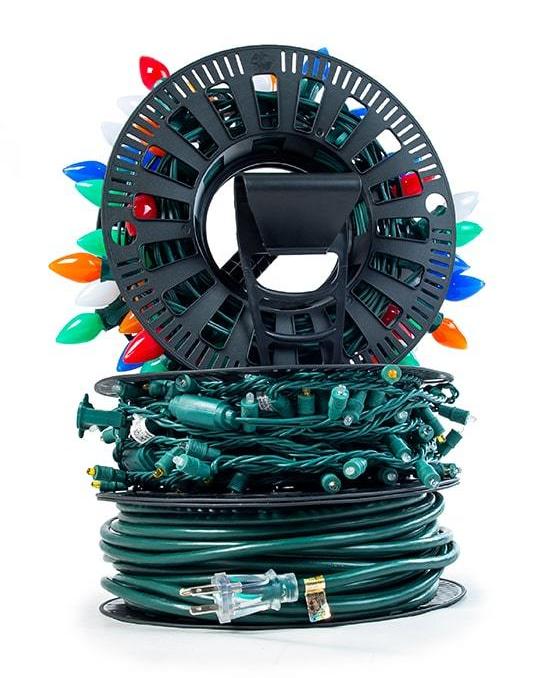 Install N Store Light storage reel full of different types of Christmas lights and extension cords.
