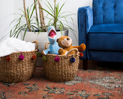 pom pom baskets in living room setting with toys