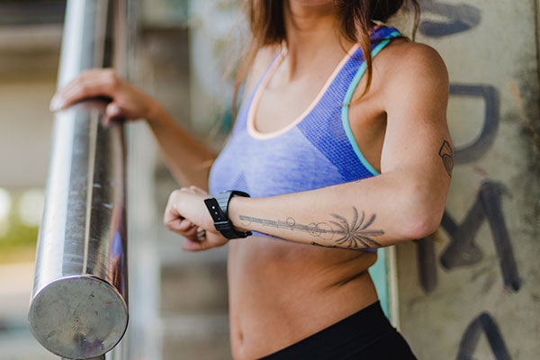 Sporty woman wearing watch