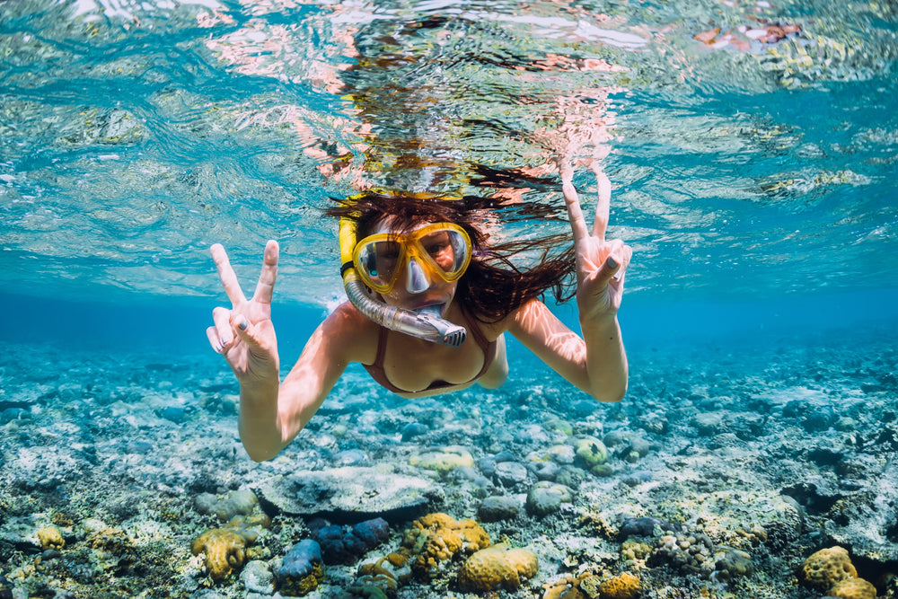 woman swimming in the ocean 