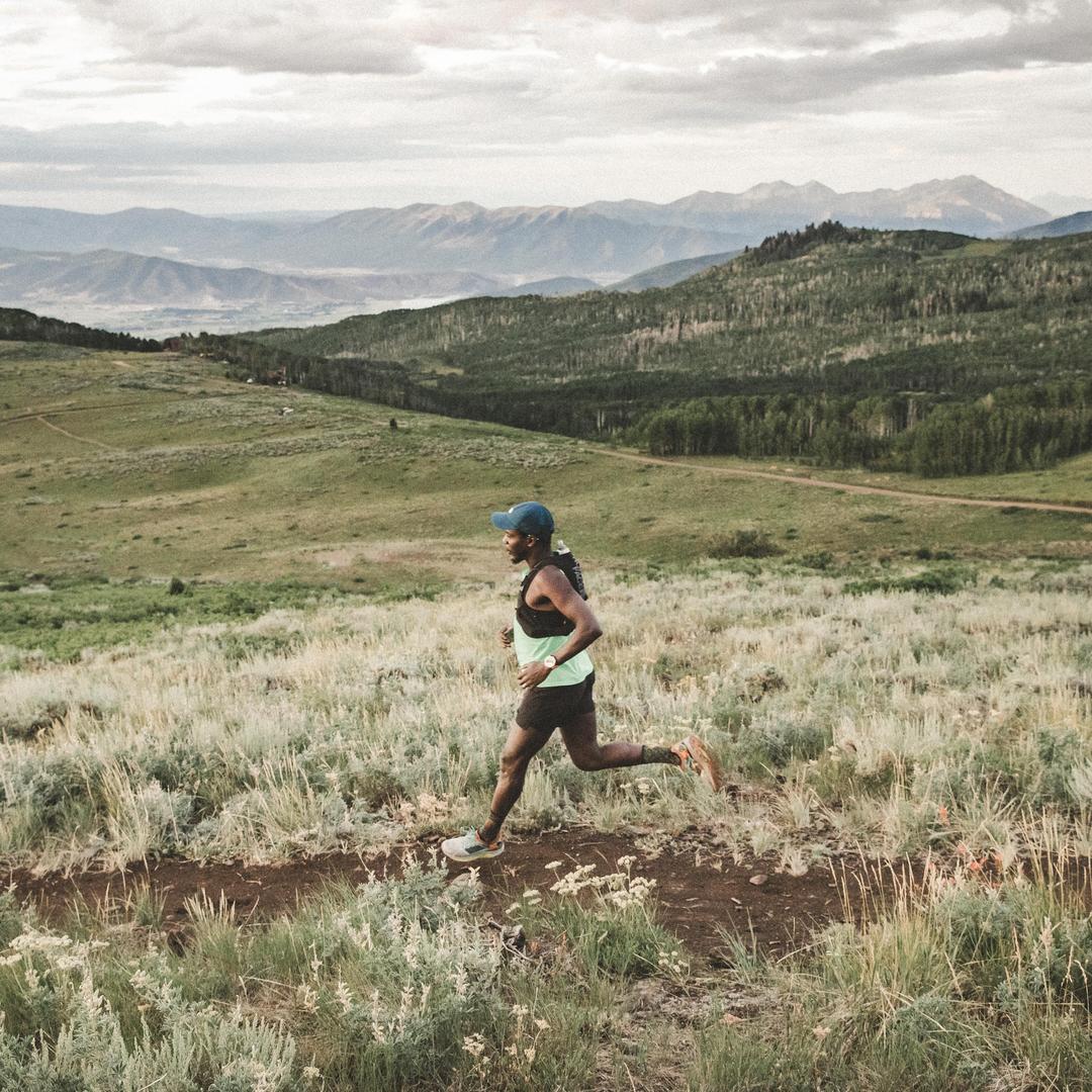 Coree running in mountains