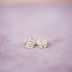 https://jesterswink.com/products/bronze-flower-rose-bud-stud-earrings