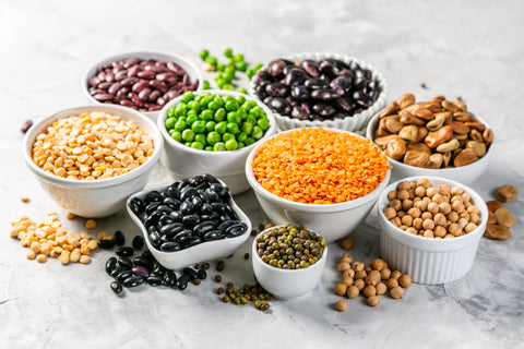 Protein rich muti color beans in white bowls