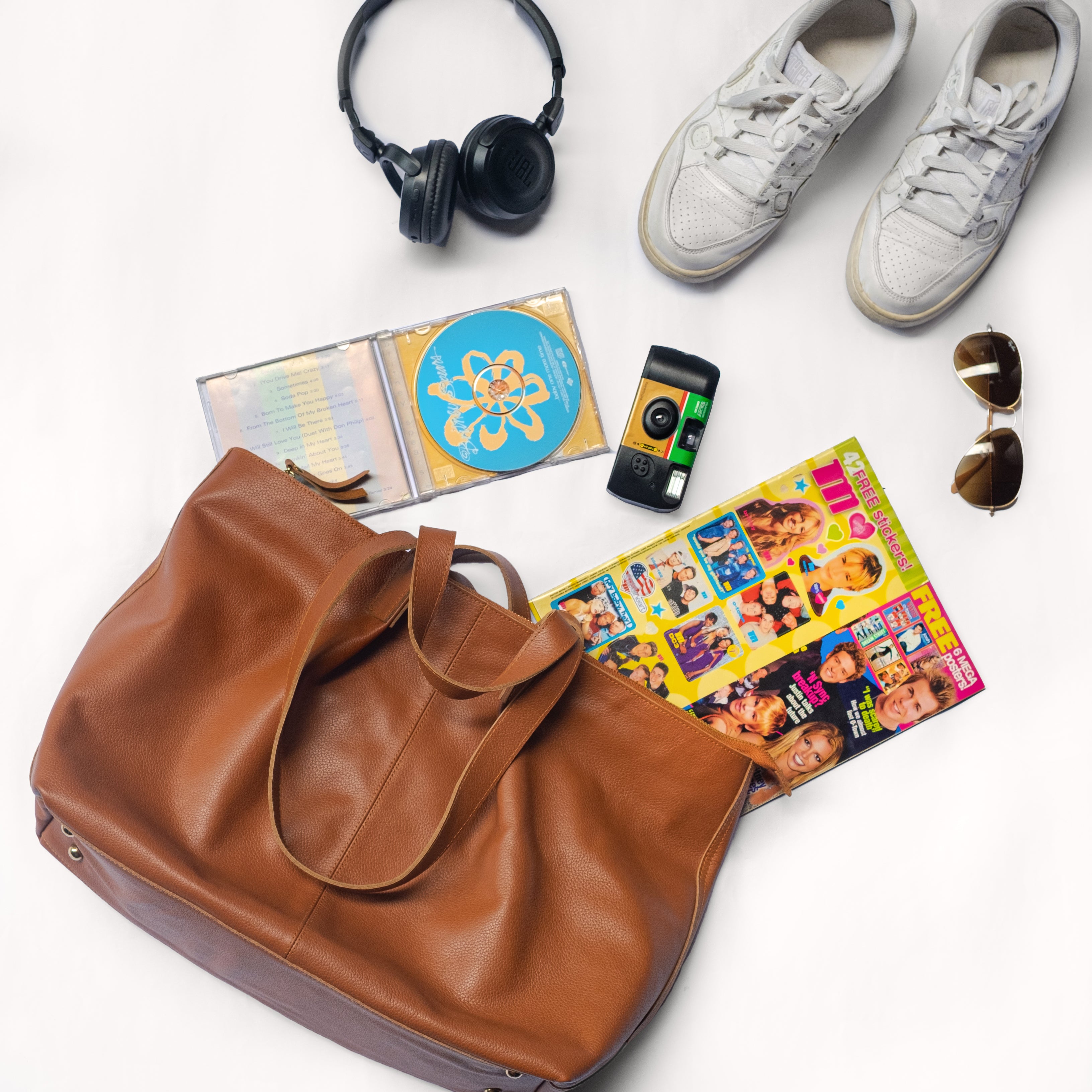 brown leather tote bag flatlay