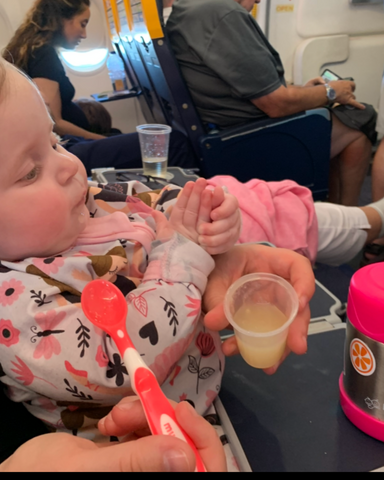 feeding a baby on a plane