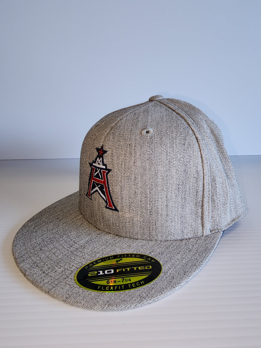 Houston Supreme on a Black Flexfit Semi Fitted cap – Ugly Guppy