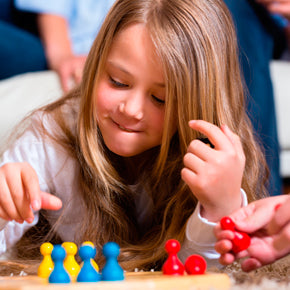 child playing board game