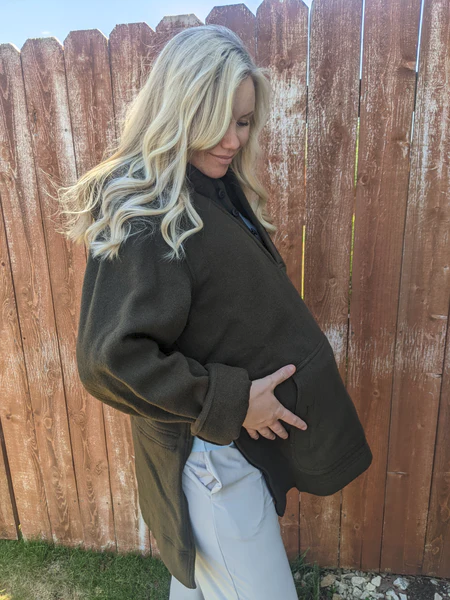 The side zips on Al’s Anorak from WeatherWool is a favorite for those who “concealed carry”.  But the side zips also provide extra room for another kind of concealed carry!