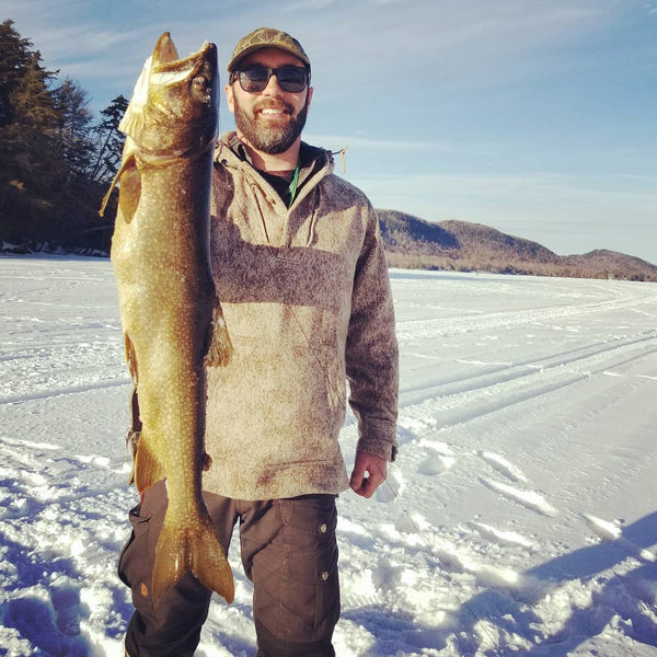 David Alexander @NatureIntoAction in his WeatherWool Anorak in MidWeight Lynx Pattern ... icefishing Adirondack Park for a great lake trout