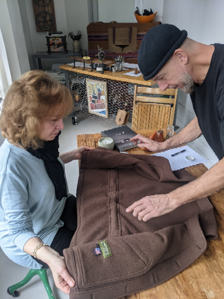 Debby and Advisor JR Morrissey discuss construction details of the WeatherWool Basic Vest at JR's Garment District (NYC) Studio in January of 2023