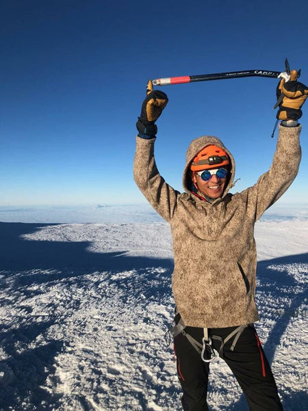 WeatherWool Advisor Don Nguyen @The_Real_Don_Nguyen at the summit of Mount Rainier in his WeatherWool Lynx Pattern Anorak