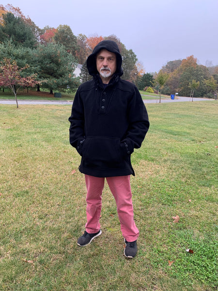 Giuseppe Monteleone, Plant Manager at American Woolen, whose role is pivotal in turning WeatherWool clean fiber into WeatherWool Fabric. Here, Giuseppe wears a WeatherWool Black Anorak. It is important the Giuseppe actually experiences all kinds of conditions in the Fabric that he creates for us!.