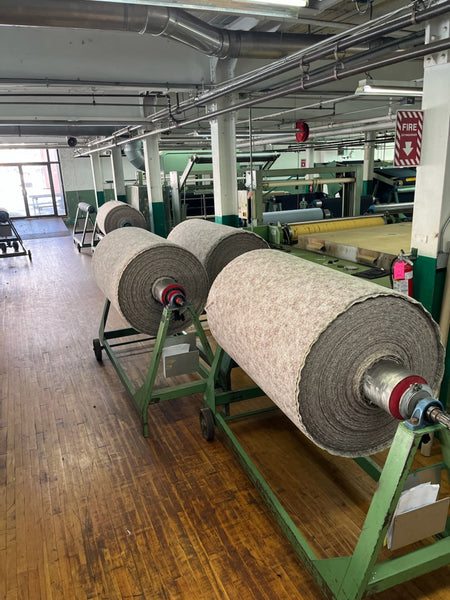 American Woolen Company (AWC) of Stafford Springs, Connecticut, is one of the companies that helps in the long and complicated process of creating WeatherWool finished Fabric from the raw (greasy) wool that WeatherWool purchases from its ranchers. American Woolen does our spinning and finishing.