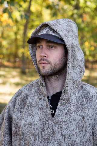 WeatherWool Advisor Chase Burnett in Lynx Poncho and Ball Cap