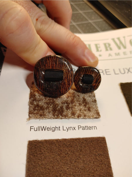 WeatherWool uses Slot Buttons, which are far more reliable than standard buttons because they are secured to the garment by a strip of nylon. These prototype Slot Buttons from Advisor Chris Christian have WeatherWool Lynx Pattern Fabric embedded in thermoplastic resin.