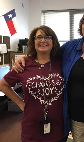 Happy customer wearing a Choose Joy t-shirt by Corinthian's Corner