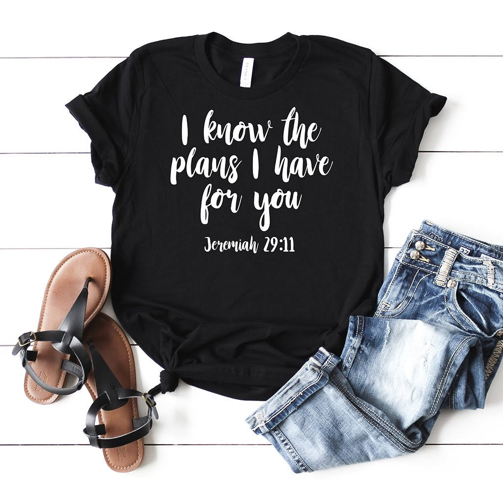 Black crewneck shirt with a bible verse from Jeremiah.