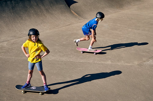 Two children skateboarding