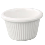 Yanco Fluted Ramekin NC-532B crafted from extra heavy-duty melamine, this round, fluted ramekin is built to last and withstand the rigors of daily use. With a 5 oz. capacity, it's ideal for serving everything from appetizers and sides to desserts and sauces. The classic bone color and design add a touch of elegance to any table setting, while the dishwasher-safe feature makes clean-up a breeze. Measuring at 3-3/8" diameter and 1-3/4" height, this ramekin is perfect for individual portions.