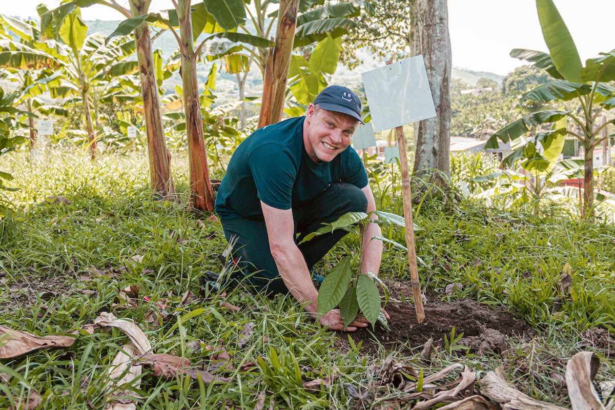 Oli Planting a Cacao Plant