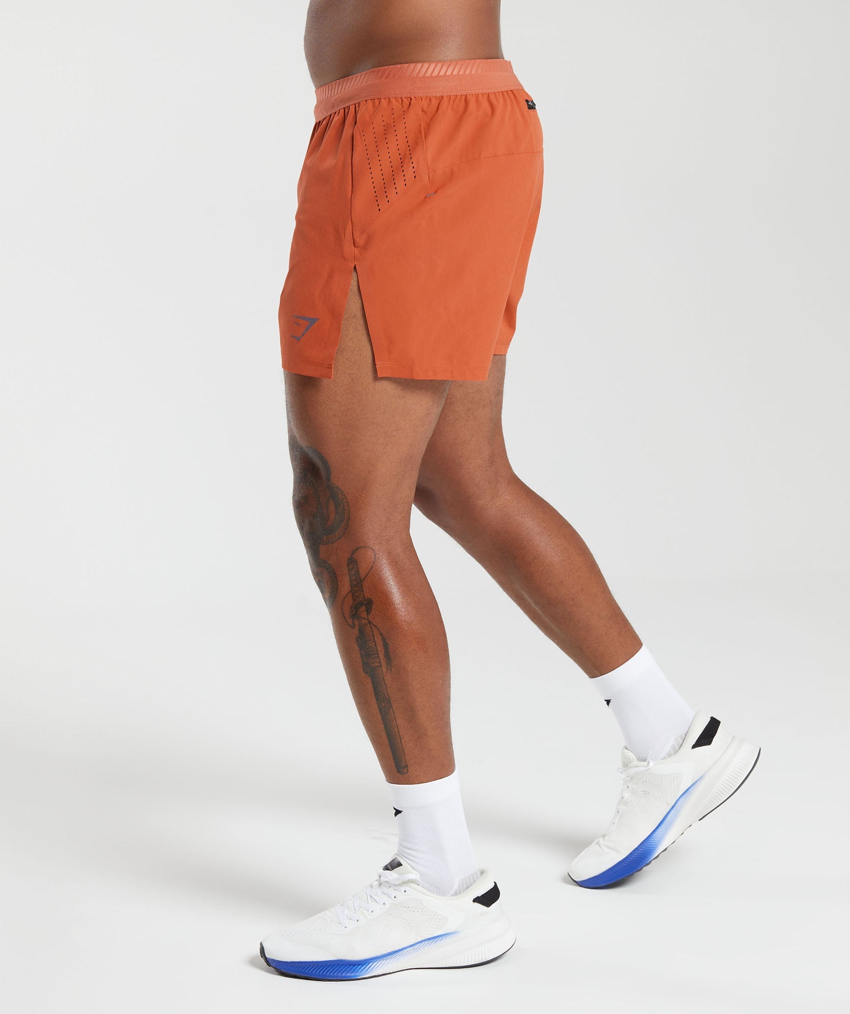 Apex Run 4" Shorts in Rust Orange - view 3