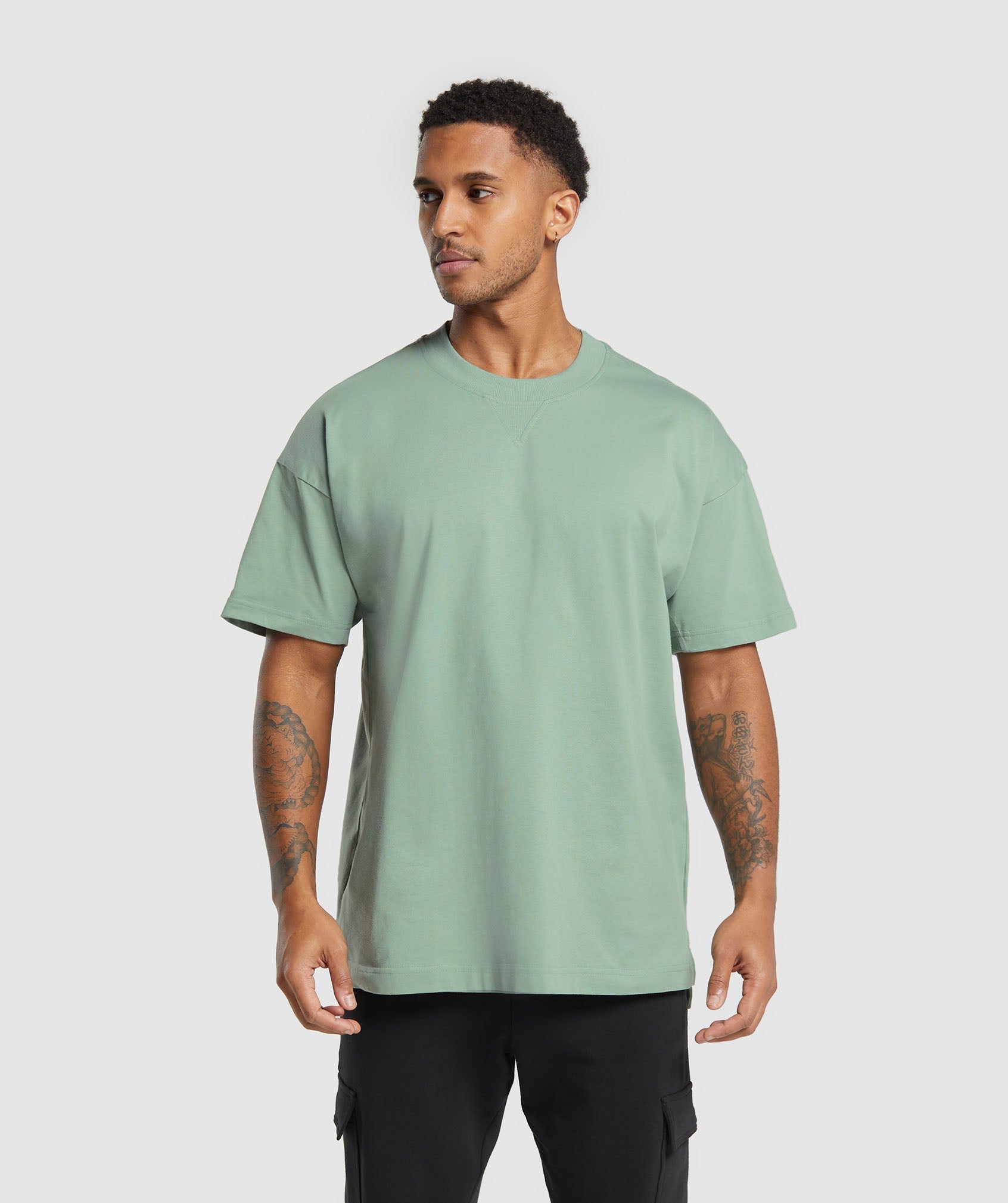 Rest Day Essentials T-Shirt dans Dollar Green