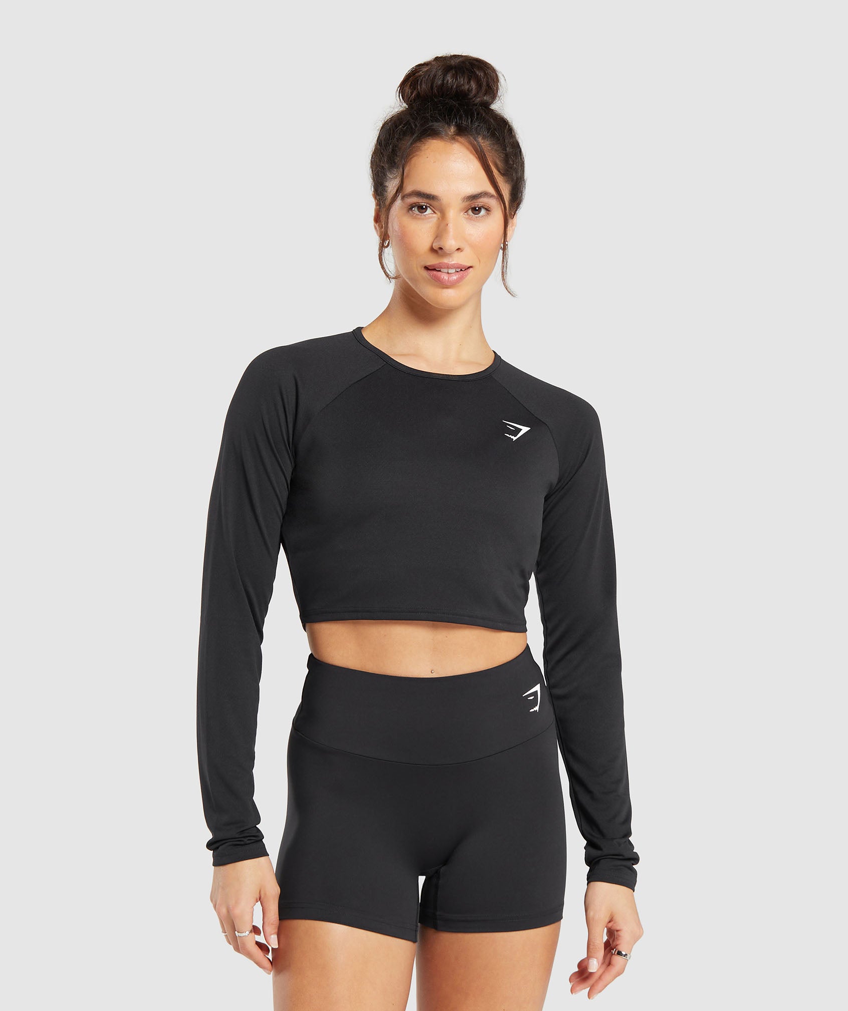 Training Long Sleeve Crop Top dans Blackest en rupture de stock