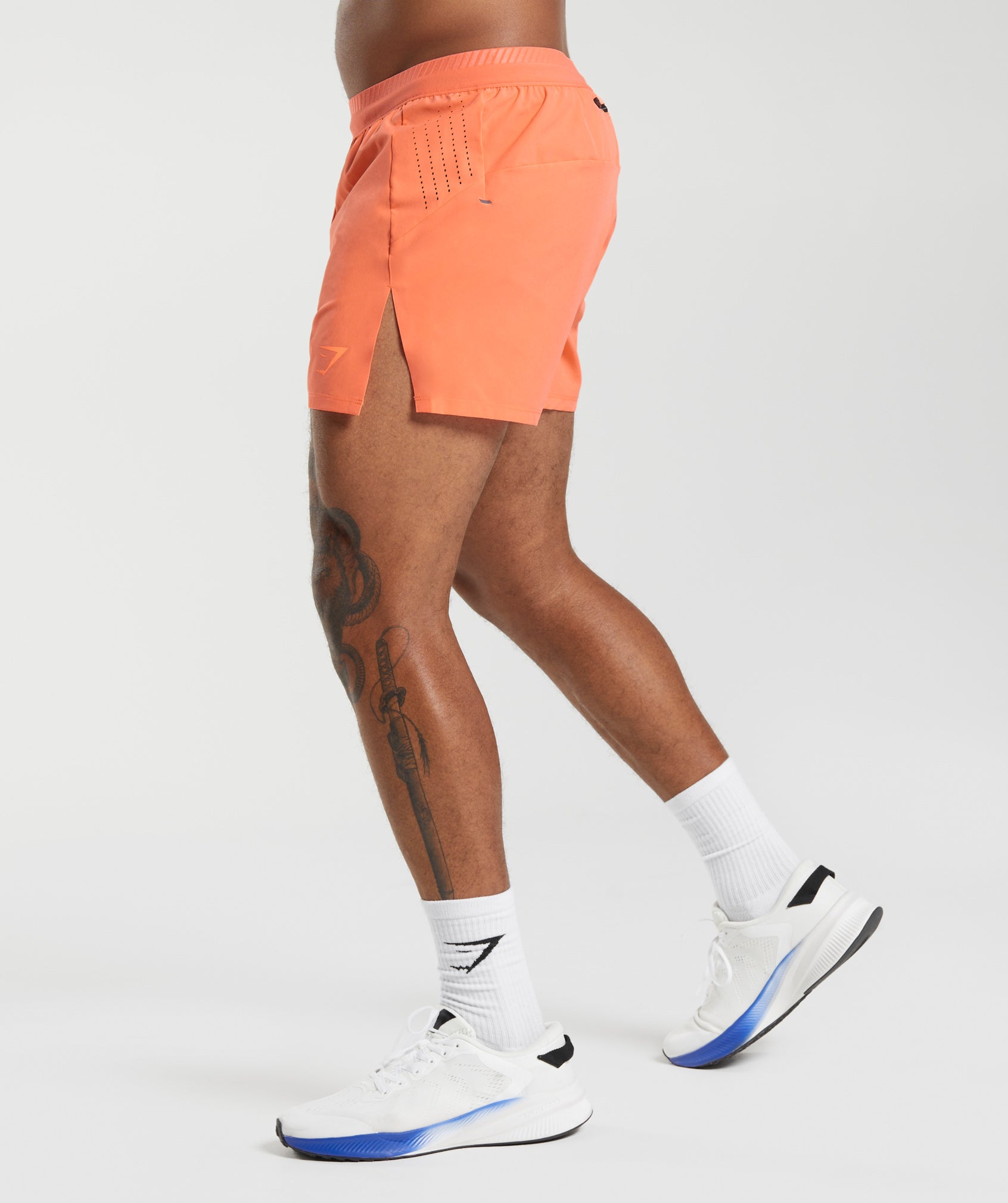 Apex Run 4" Shorts in Solstice Orange - view 3