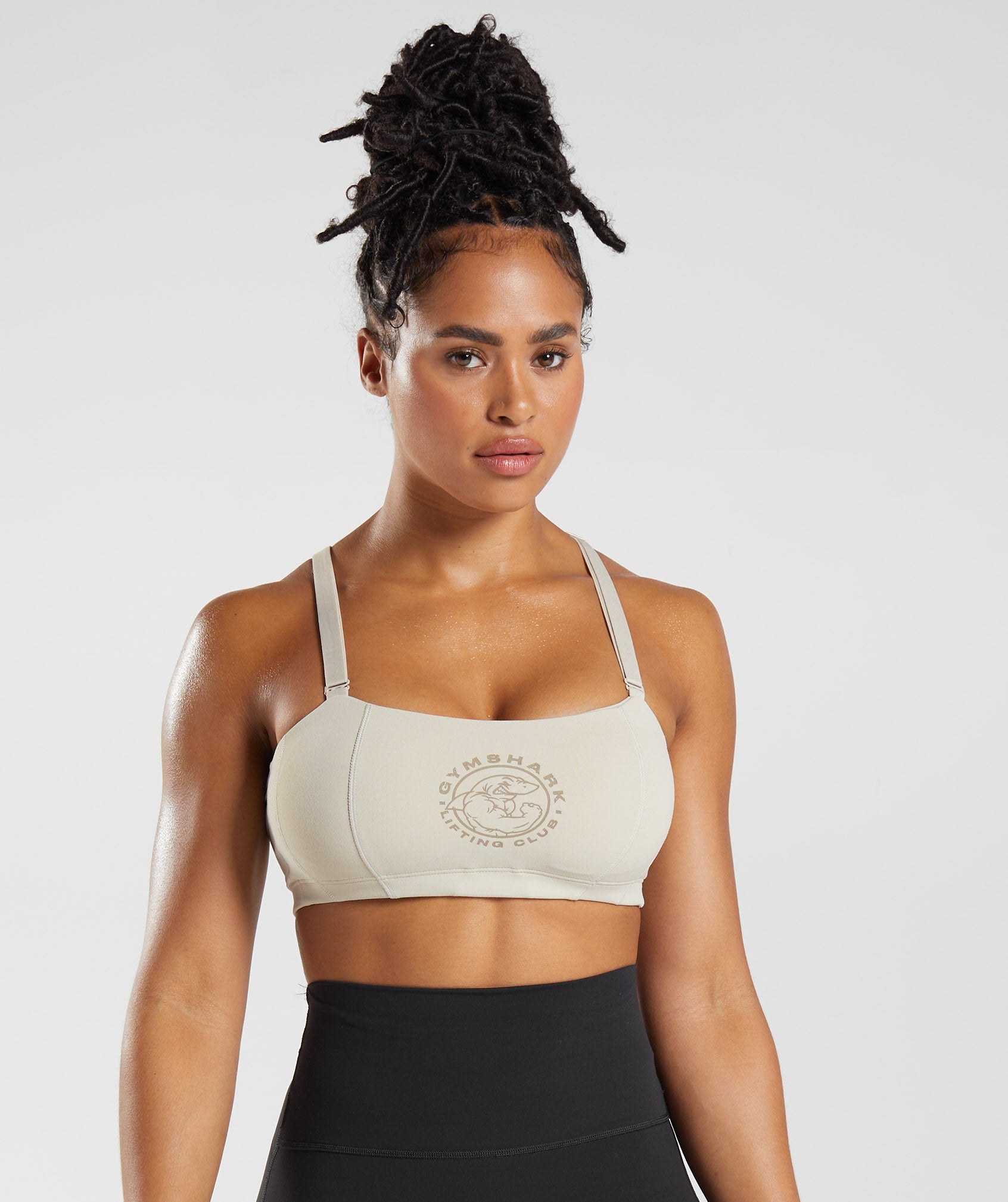 Legacy Sports Bra dans Pebble Greyest en rupture de stock