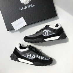 chanel sneaker black white