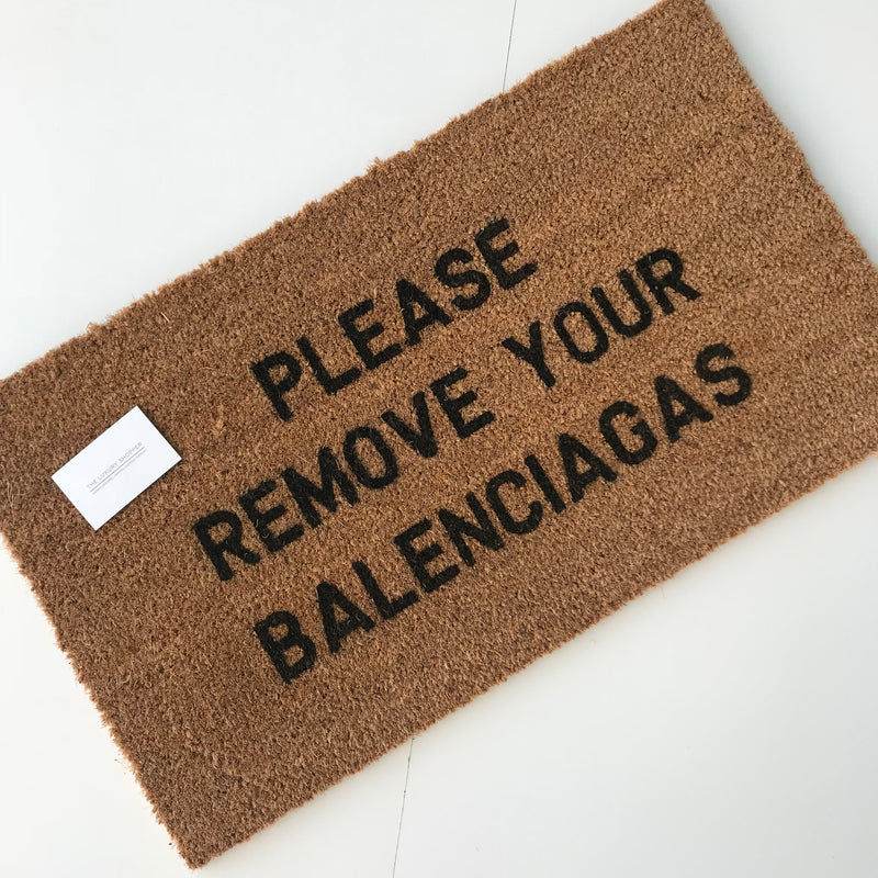 please remove your balenciaga's floor mat