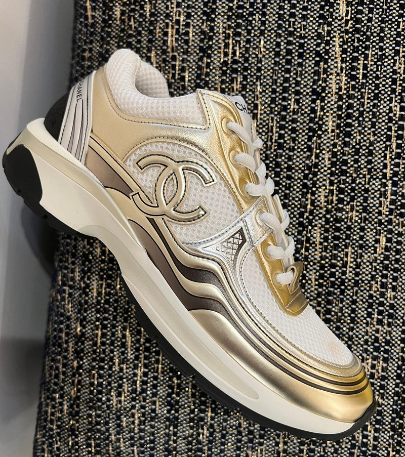 Chanel CC Logo Metallic Trainer (White/Gold/Silver) 2022 – The Luxury  Shopper