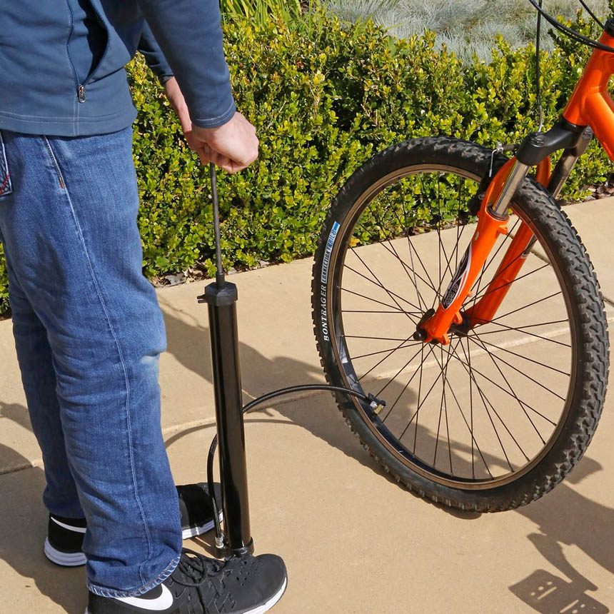 Slime pump airing up bicycle tire