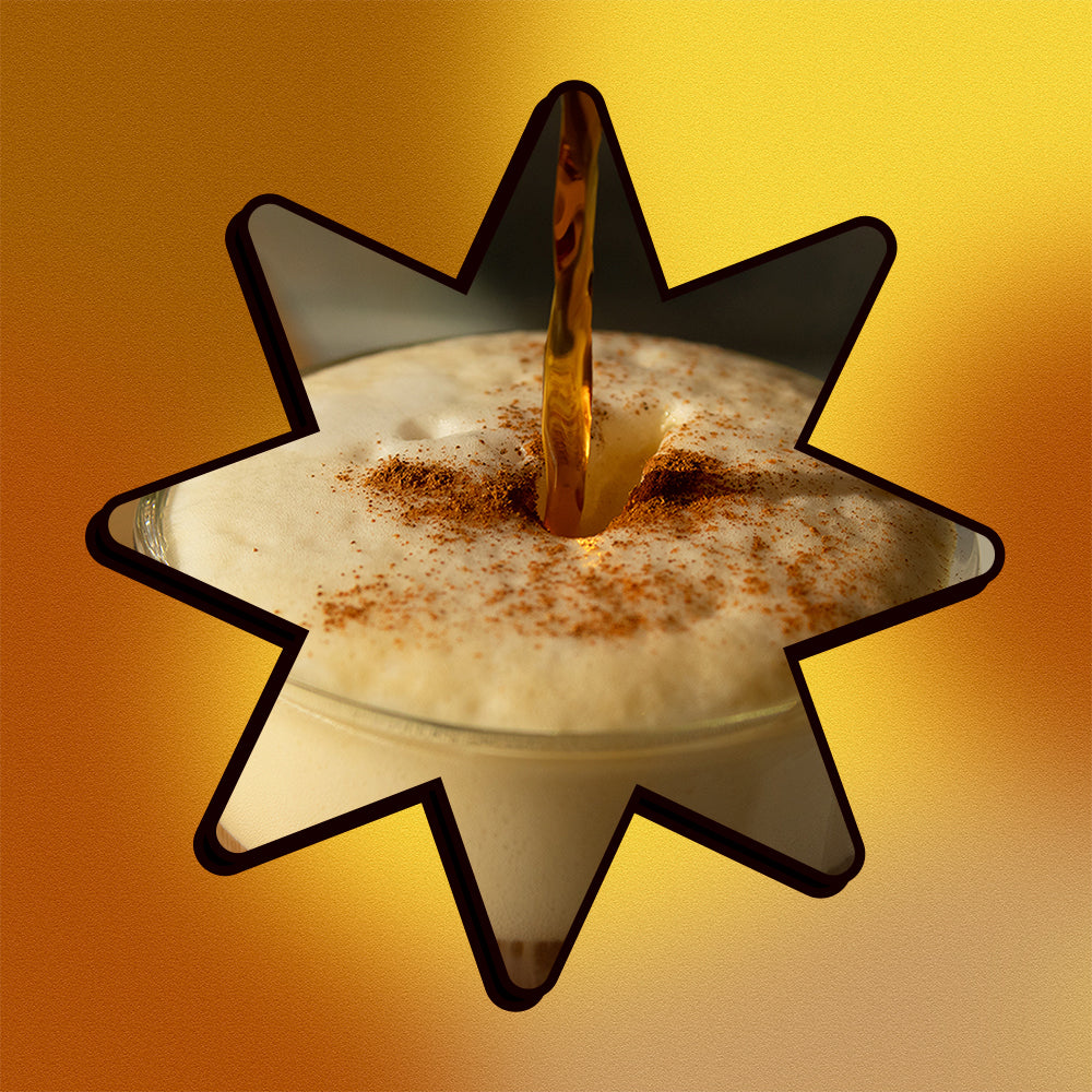 A Caramel Brulee Latte in a star shape on a mesh gradient background.